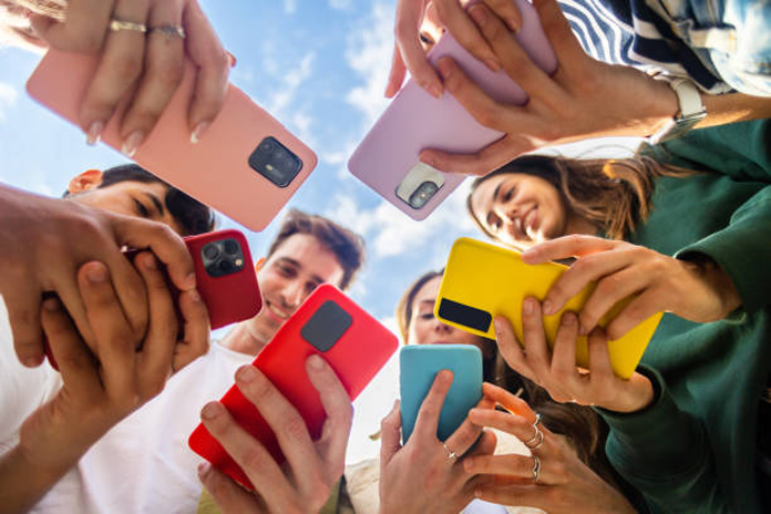Diverse people with smartphones
